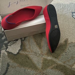 Rothy’s red shoes.